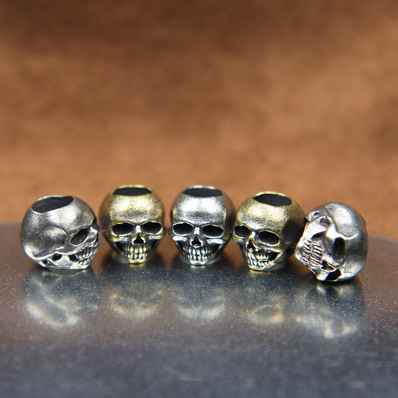 Mini Skull Head Brass Knife Be - огляд і ціна Paracord Survival Bracelet